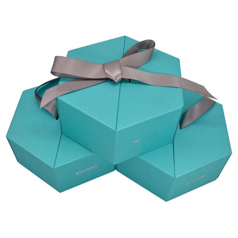 Caixa-presente magnética hexagonal verde com fita e espuma inserir folha estampagem superfície de papelão rígido