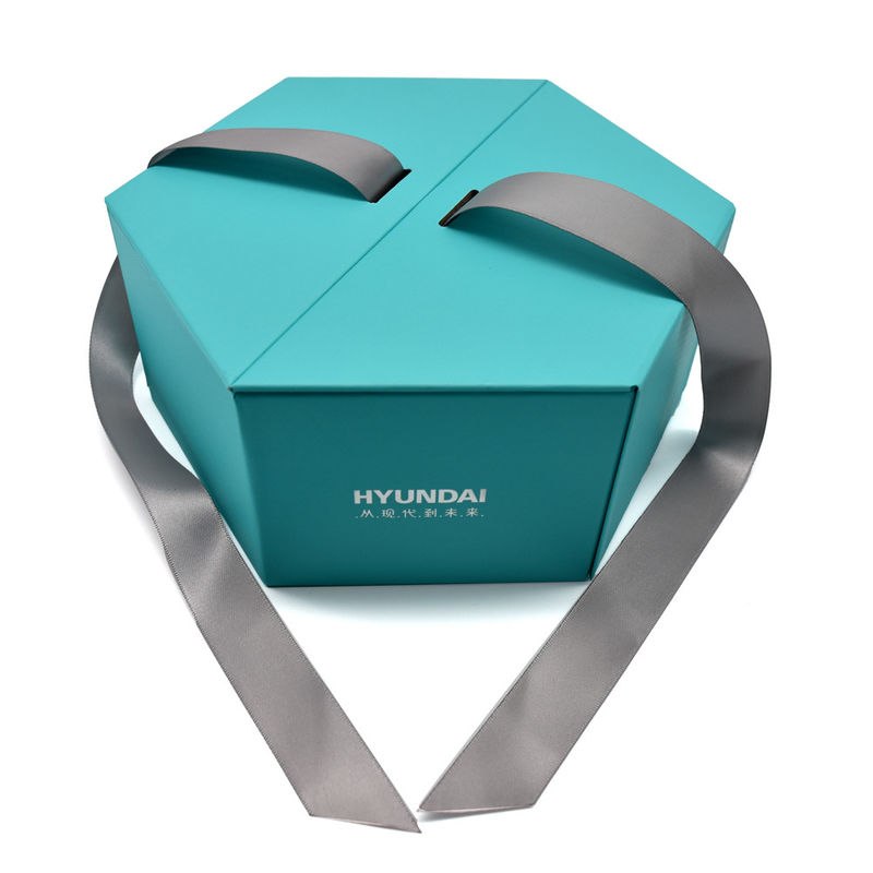 Caixa-presente magnética hexagonal verde com fita e espuma inserir folha estampagem superfície de papelão rígido